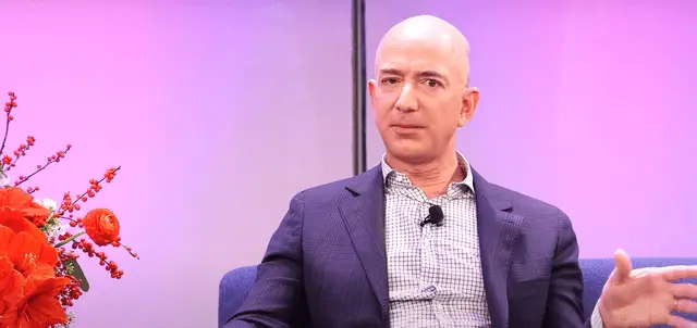what religion is jeff bezos? how much does jeff bezos make a day?